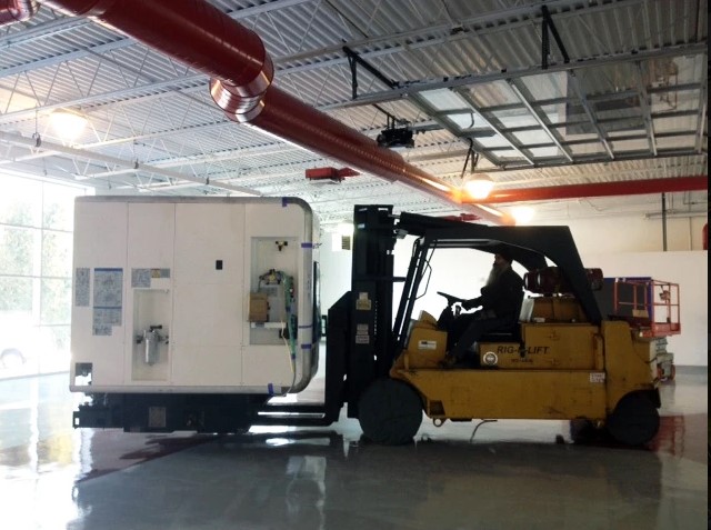 Forklift machine in action.